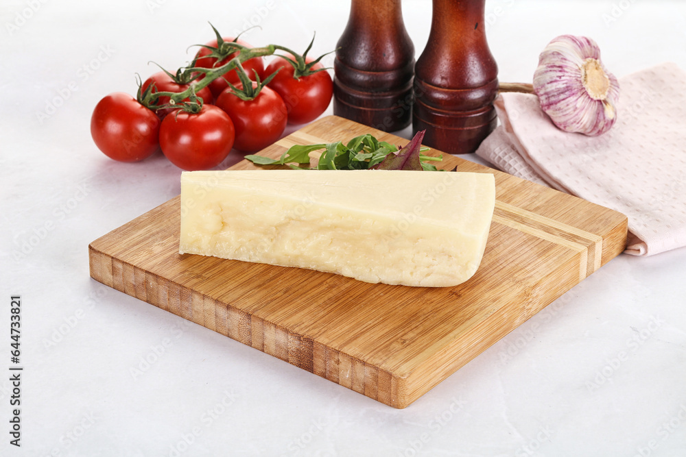 Piece Italian hard parmesan cheese Piece Italian hard parmesan cheese