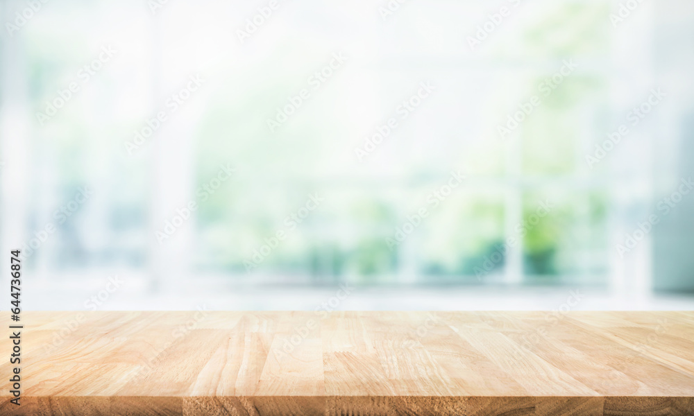 Selective focus.Empty of wood table top on blur of curtain with window and green from garden background.For montage product display or design key visual layout - obrazy, fototapety, plakaty 