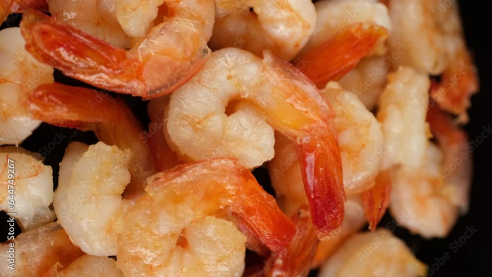 Fresh fried shrimps in plate, rotation. Vertical video Fresh fried shrimps in plate, rotation. Vertical video