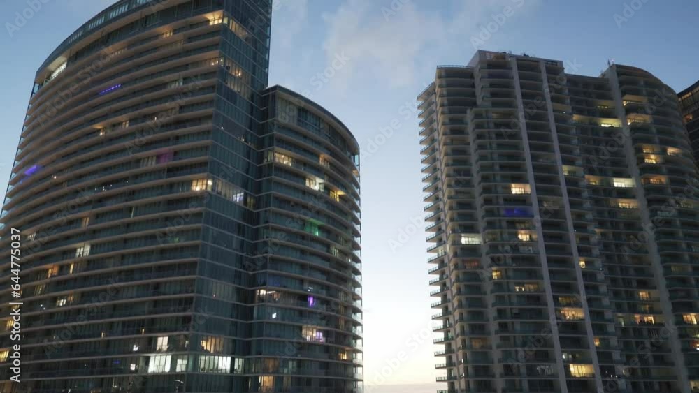 aerial tilt close up of luxury modern skyscraper building apartment in Miami downtown Florida aerial tilt close up of luxury modern skyscraper building apartment in Miami downtown Florida