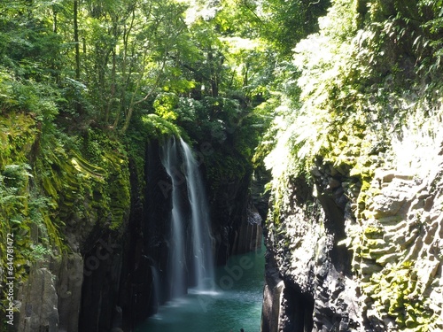 Takachiho Gorge  a narrow chasm cut through the rock by the Gokase River and partway along the gorge is the 17 meter high Manainotaki waterfall cascading down to the river below