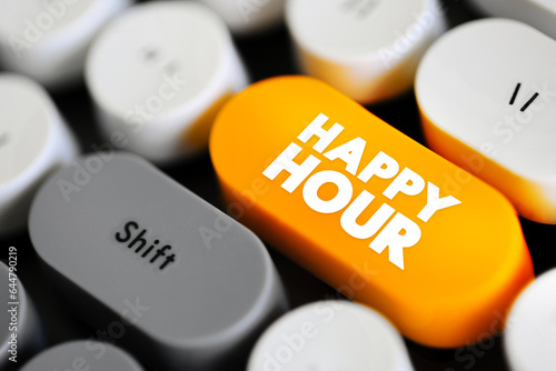 Happy Hour is a marketing term for a time when a venue such as a restaurant or bar offers reduced prices on alcoholic drinks, text concept button on keyboard