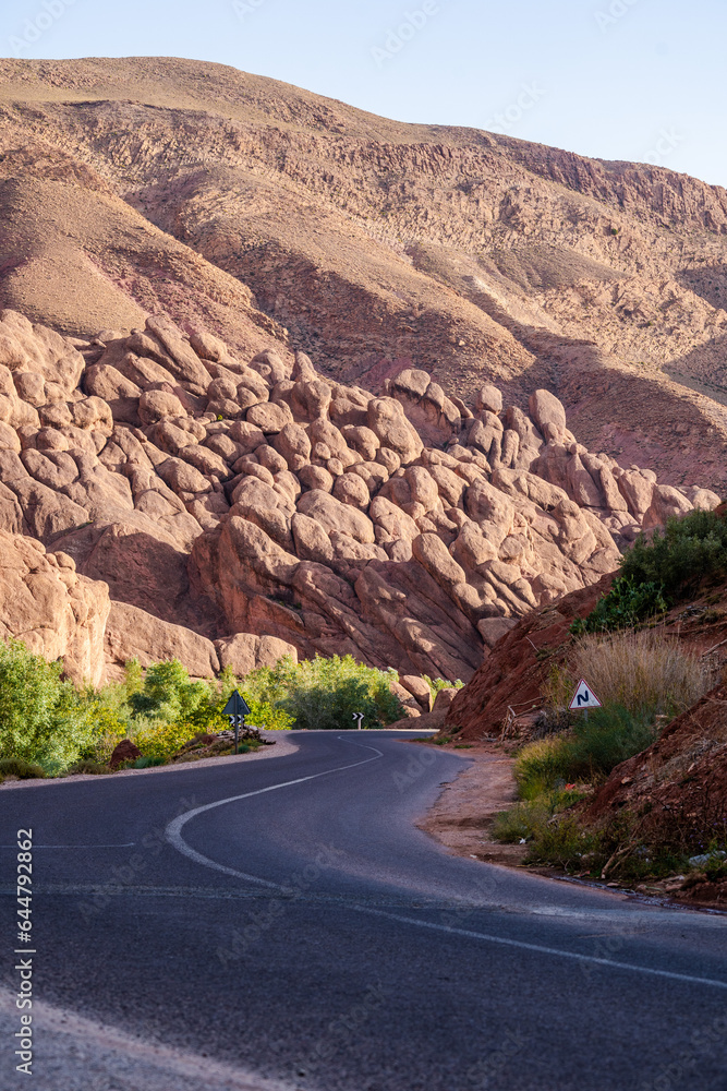Single road through the mountains in Dades Gorge Morocco during sunset