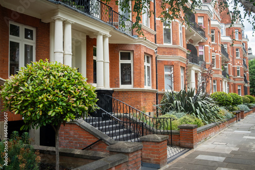 London- street of typical red brick terraced houses in Maida vale  photo