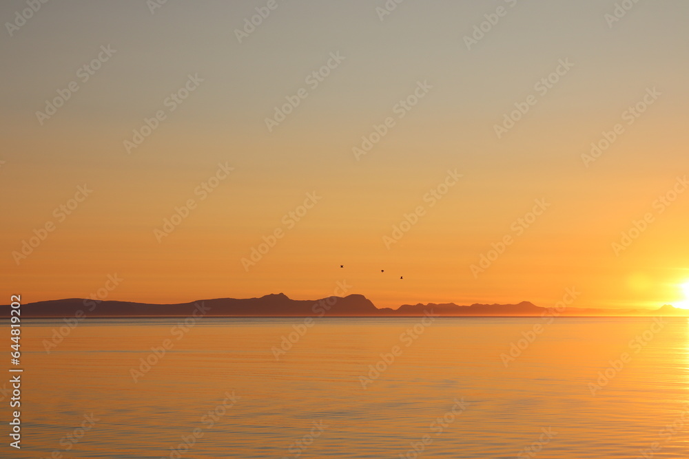 Naklejka premium sunset over the sea