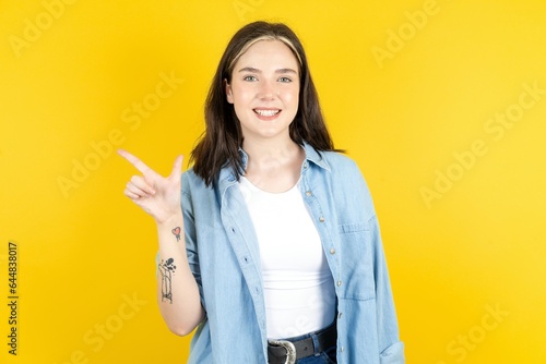 Beautiful woman wearing casual clothes pointing up with fingers number eight in Chinese sign language BÄ. photo