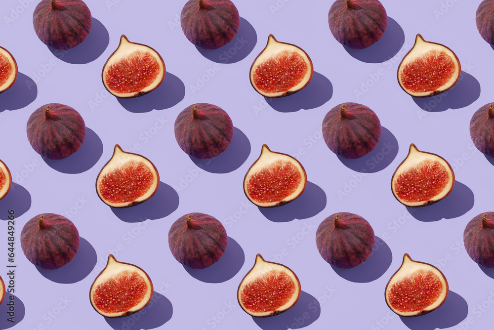 Fresh figs pattern on a bright violet background, top view Fresh figs pattern on a bright violet background, top view