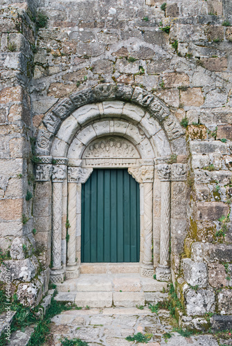 Old stone archway with green door  Santuario de San Xiao de Moraime  Muxia  Galicia  Spain