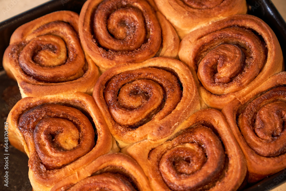 High angle of cinnamon rolls on baking pan High angle of cinnamon rolls on baking pan