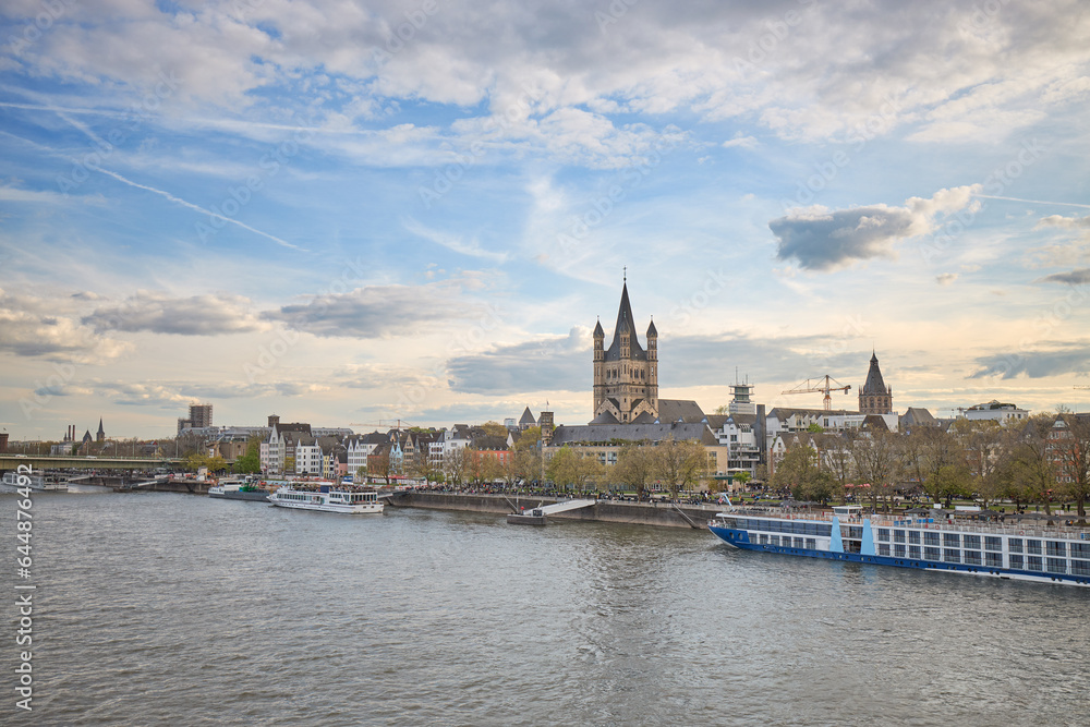 Panoramic view of the Rhine river as it passes through the city of Cologne, Germany.