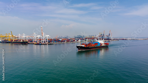 cargo container ship sailing in sea to import export goods and distributing products to dealer and consumers across worldwide, by container ship Transport, commercial port background,