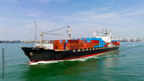cargo logistic container ship sailing in sea to import export goods and distributing products to dealer and consumers worldwide, by container ship Transport, commercial port background,