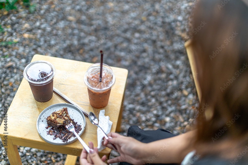 Background of wooden chairs or modern chairs that are placed in the interior of a restaurant or coffee shop for customers to sit while using the service. Background of wooden chairs or modern chairs that are placed in the interior of a restaurant or coffee shop for customers to sit while using the service.