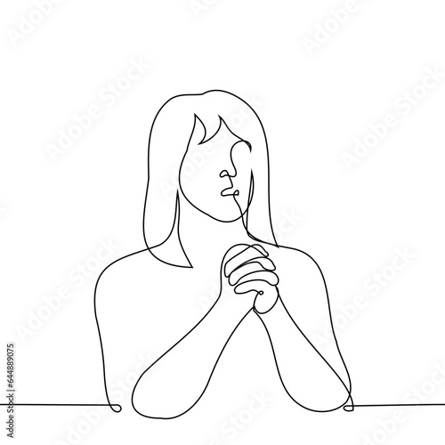 woman in praying pose - one line art vector. female prayer concept