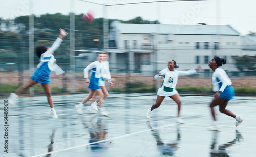 Sports, netball team player and women running, cardio or challenge for ball, competition and play active game. Motion blur, outdoor tournament and group workout, exercise and player training together