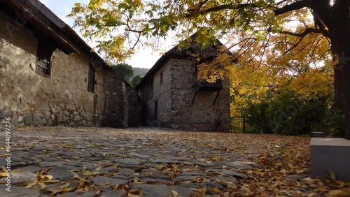 Low angle view walking towards Agios Ioannis Lambadistis church, an important landmark in the Troodos mountains in Cyprus photo