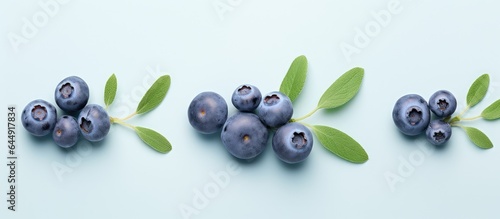 Three berries blue and alone on dark isolated pastel background Copy space