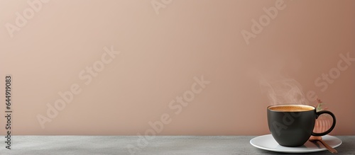 Black coffee cup placed alone on isolated pastel background Copy space