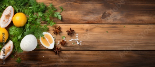 Spicy boiled eggs with rice herbs and lemon slice on isolated pastel background Copy space en table