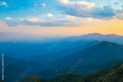 Peak of tropical forest mountain sunset sky with cloud nature landscape background