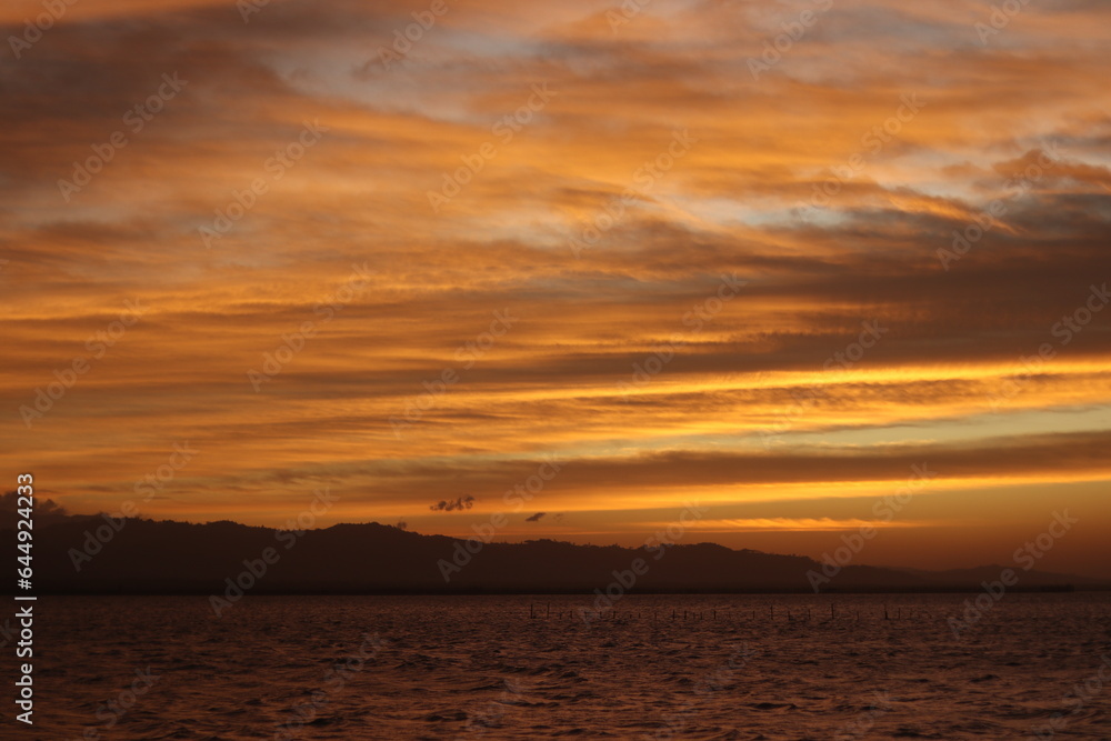 Beautiful golden sunset on the lake
