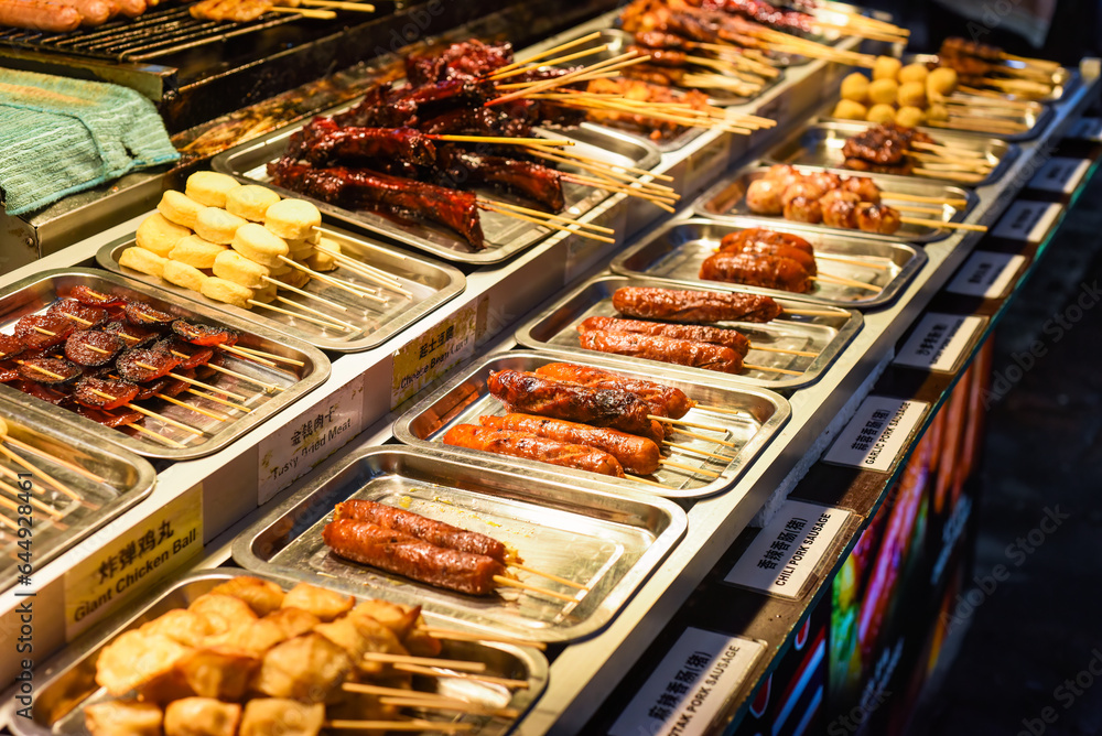 Obraz premium Grilled chicken wings bbq in Jalan Alor street food in Kuala Lumpur