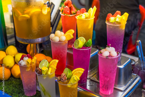 Photography Many smoothie and drinks in plastic cups in Jalan Alor street food in the Kuala