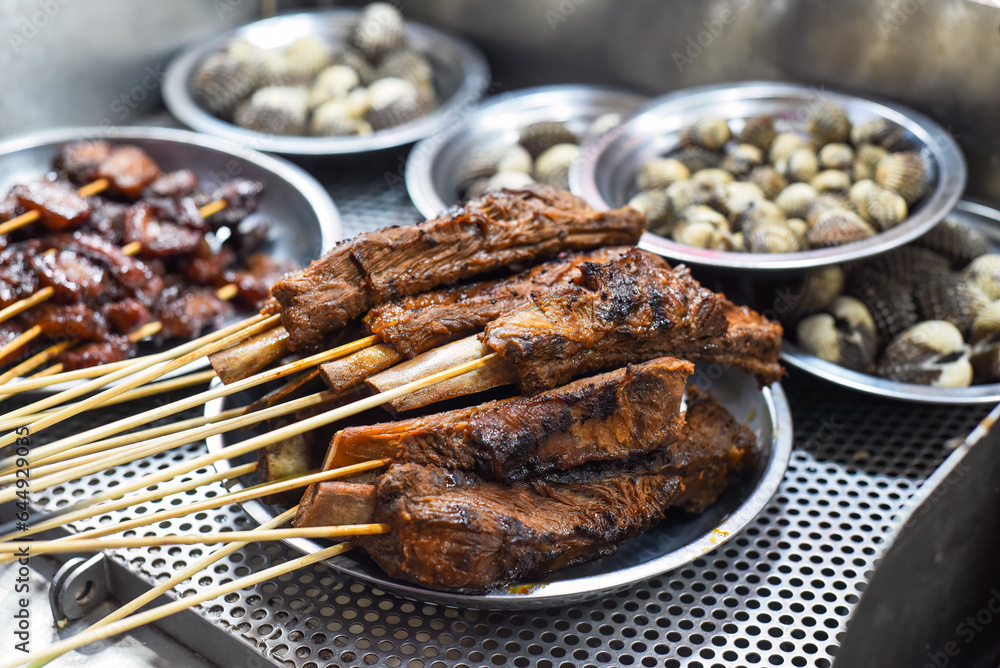 Grilled beef ribs bbq in Jalan Alor street food in Kuala Lumpur