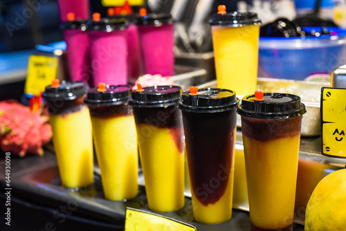 Photography Many smoothie and drinks in plastic cups in Jalan Alor street food in the Kuala