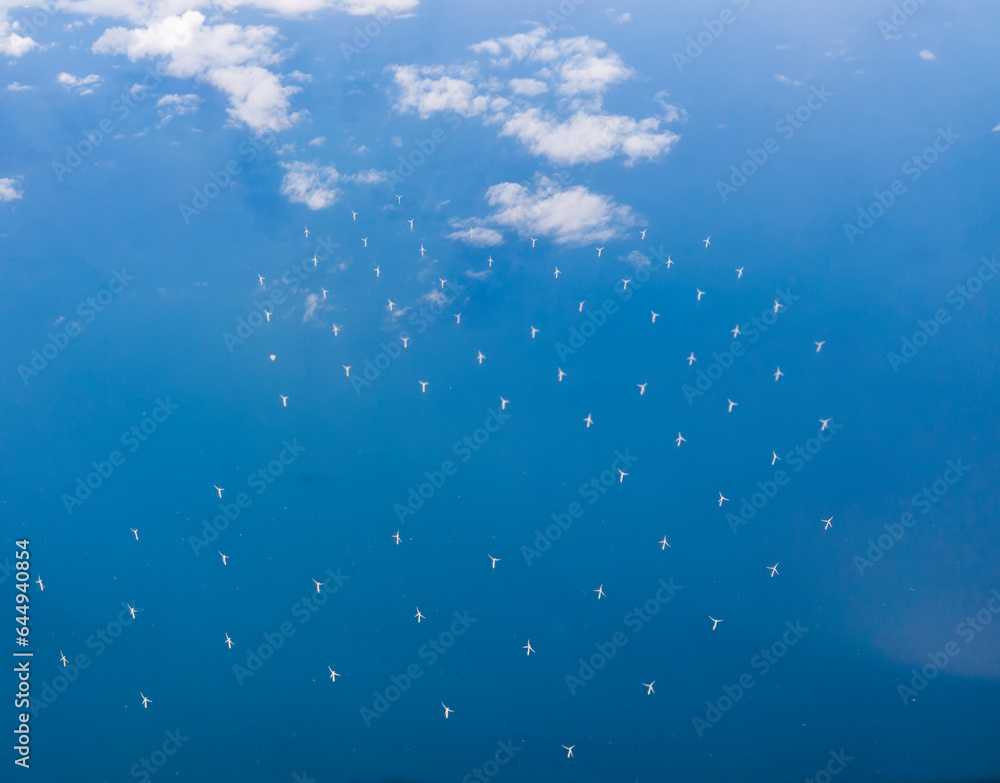 Looking down on an off-shore wind farm in the English Channel off the coast of Sussex, UK Looking down on an off-shore wind farm in the English Channel off the coast of Sussex, UK
