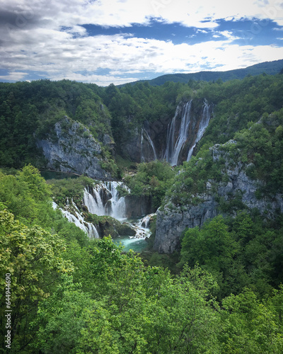 Scenic view of the waterfall in the mountain forest near Plitvička Jezera, Croatia, May 2019