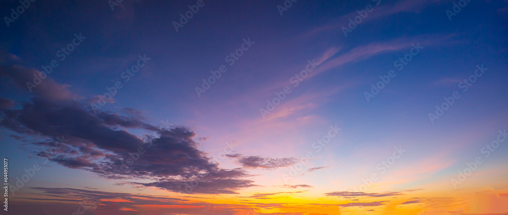 Clouds and sky of morning and evening light,Real amazing panoramic sunrise or sunset sky with gentle colorful clouds. Long panorama, crop it