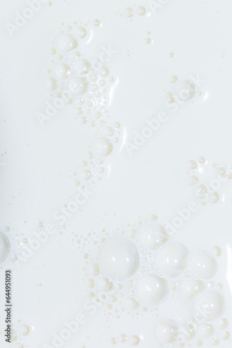 macro soy milk texture,White surface of milk and bubbles and ripples from above birds eye view