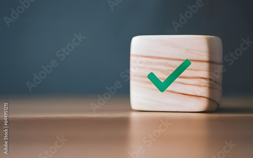 Green checkmark icon on wooden block cube. Check mark, Check Mark Sign, Tick Icon, right sign, circle green checkmark button, Done, approve concept on blue background. 