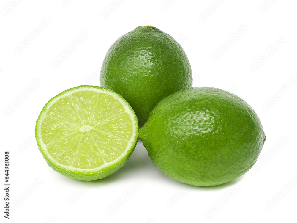 Fresh green lemons and lime leaves placed on a white background. Fresh green lemons and lime leaves placed on a white background.