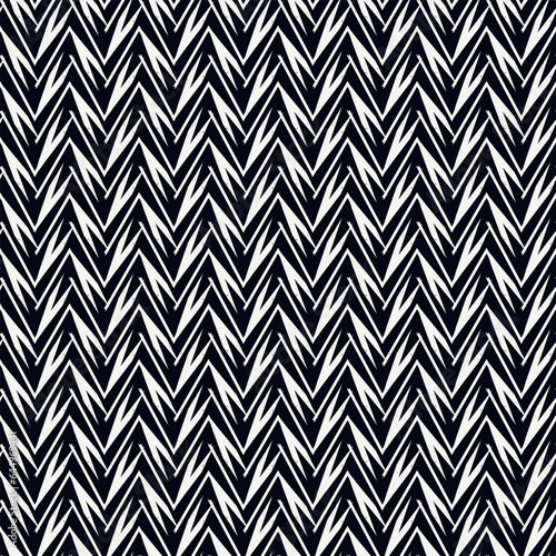 Ethnic seamless pattern. Freehand zigzag stripes print. Boho chic design background. Tribal style wallpaper. Brush wavy lines. Handdrawn geometric ornament. Chevron backdrop. Indigenous image.