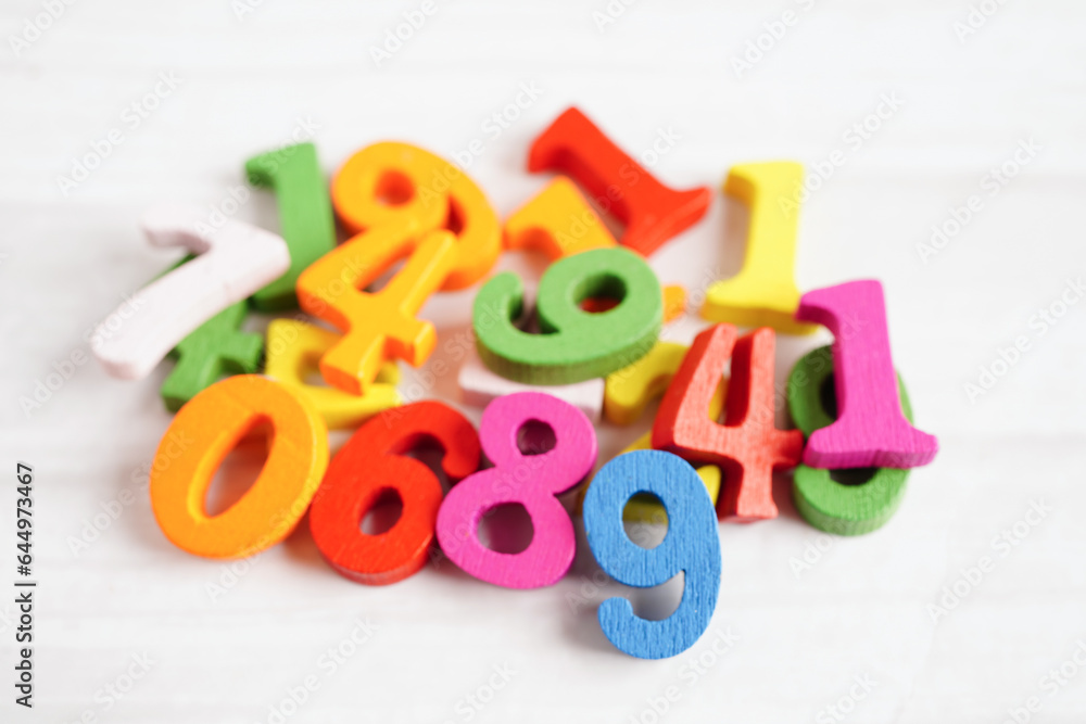 Naklejka premium Number wood block cubes for learning Mathematic, education math concept.