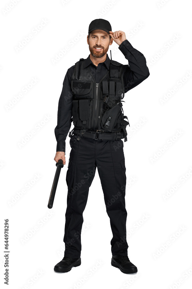 Handsome cop in uniform adjusting police cap, while standing in studio. Front view of bearded officer with truncheon, wearing black peaked cap, isolated on white background. Uniform, outfit concept. Handsome cop in uniform adjusting police cap, while standing in studio. Front view of bearded officer with truncheon, wearing black peaked cap, isolated on white background. Uniform, outfit concept.