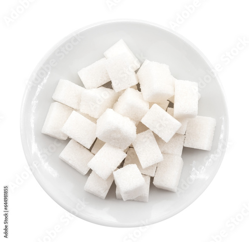 White plate with sugar cubes on a white background. View from above. Sugar
