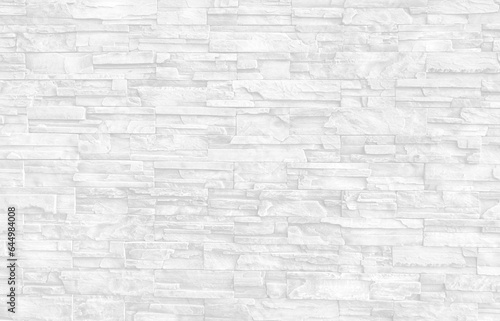Empty black and white (light gray) grain stone brick wall made with blocks for abstract background and texture. beautiful patterns, space for work, banner, wallpaper close up, horizontal.