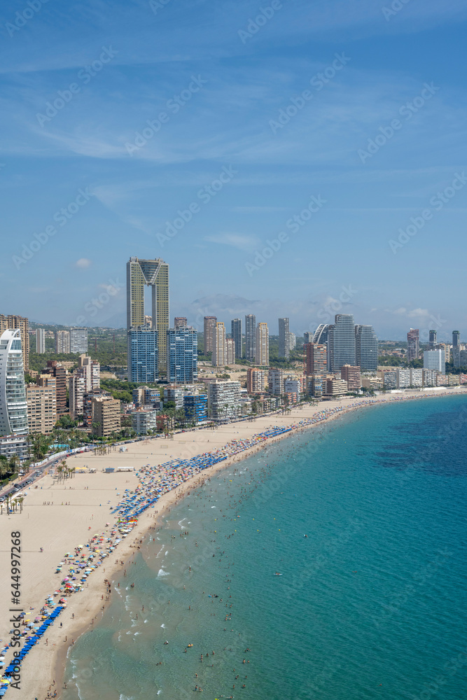 Benidorm, Spain - August 19, 2023: Panoramic view of the Poniente beach in the city of Benidorm, Spain Benidorm, Spain - August 19, 2023: Panoramic view of the Poniente beach in the city of Benidorm, Spain