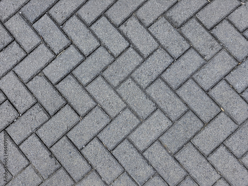 Outdoor grey paving texture, good for residential townhouse road complex or pavement or sidewalk base material.