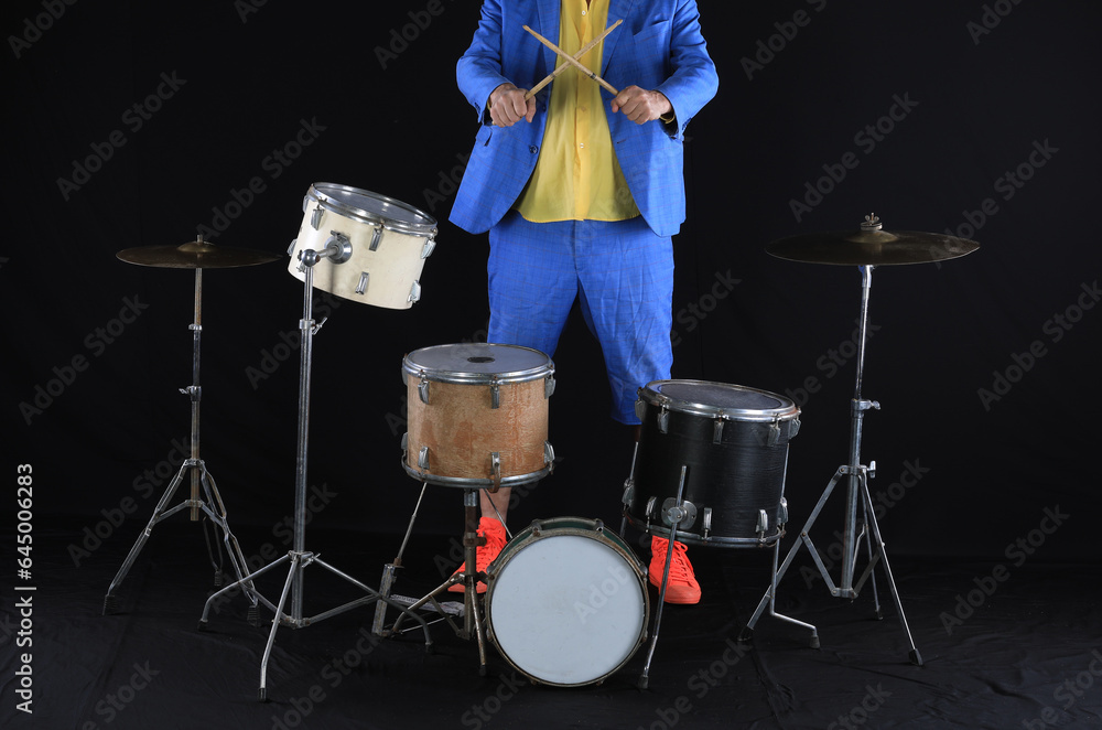 Fototapeta premium professional set of drummers on a black background