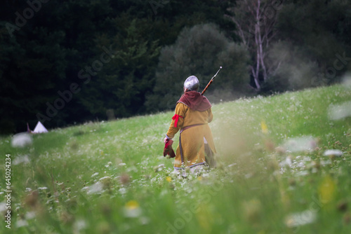 Bilde på lerret Viking woman warrior from early middle ages walking from battle.