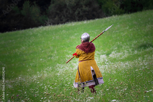 Viking woman warrior from early middle ages walking from battle.