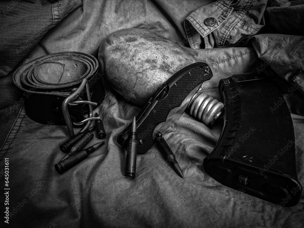 knife, flask and ammo in army style