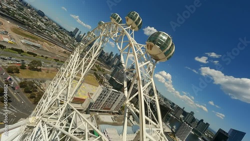 Ferris wheel in Melbourne FPV drone video. Amusement park. photo