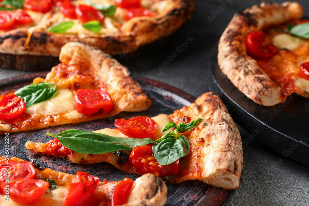 Slices of tasty pizza Margarita on table Slices of tasty pizza Margarita on table