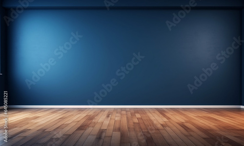 Empty dark blue wall with wooden floor and beautiful chiaroscuro. Minimalist background for product presentation, backdrop © Muneeb