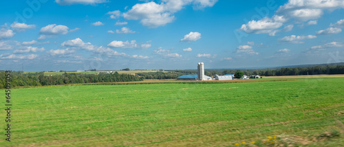 Farm on the road in the Canadian countryside in Quebec photo